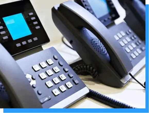 VoIP office phones with digital display and keypad for business communication and professional call management.