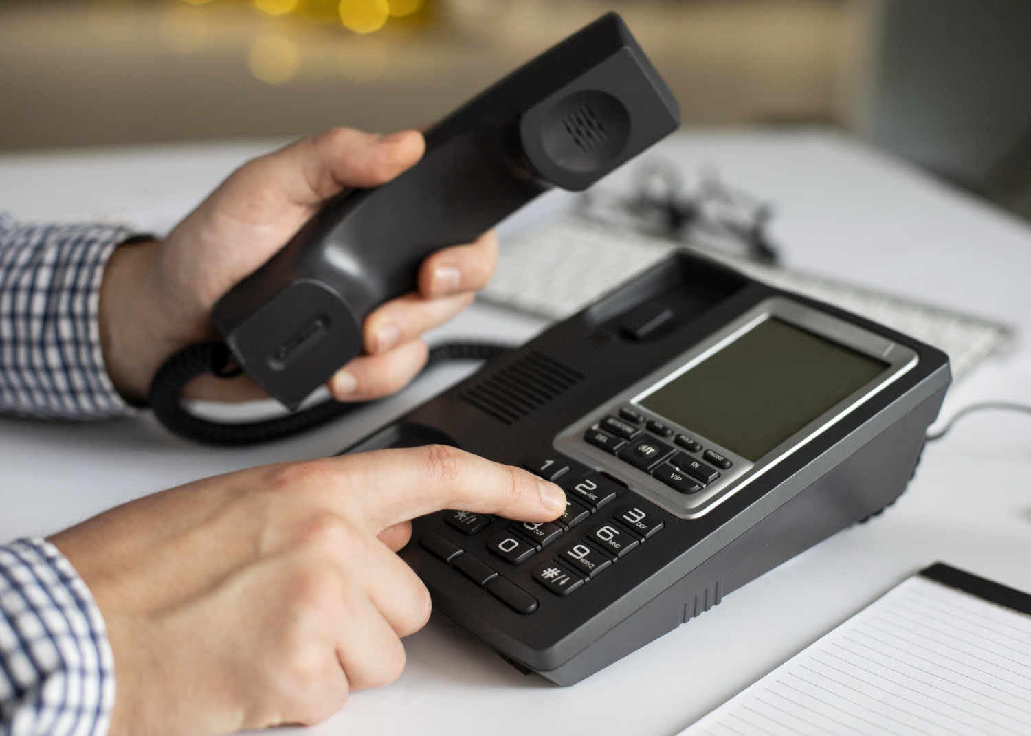 Business office communication systems with modern IP desk phones and VoIP technology for efficient business communication.