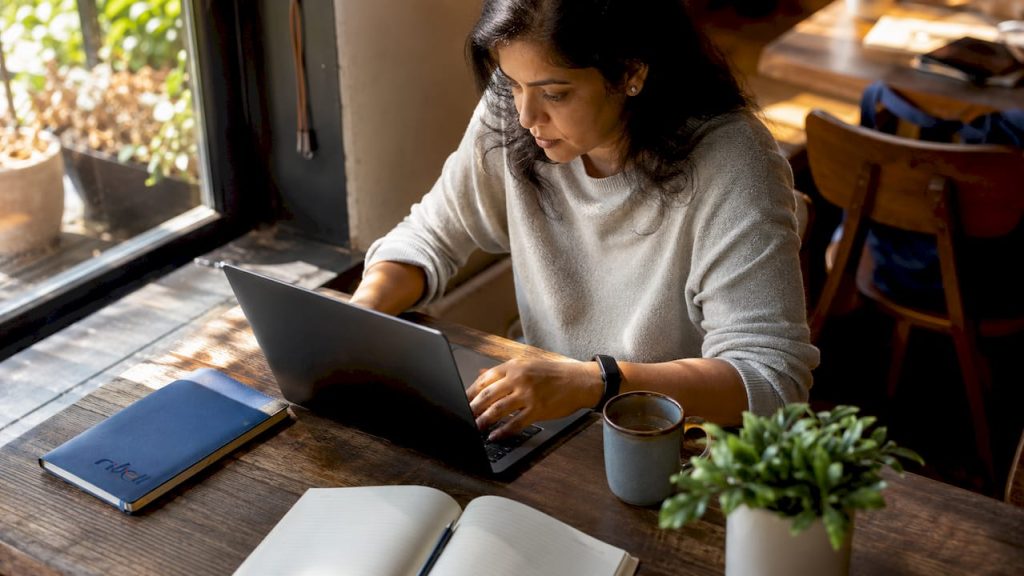 IT specialist working on endpoint security laptop